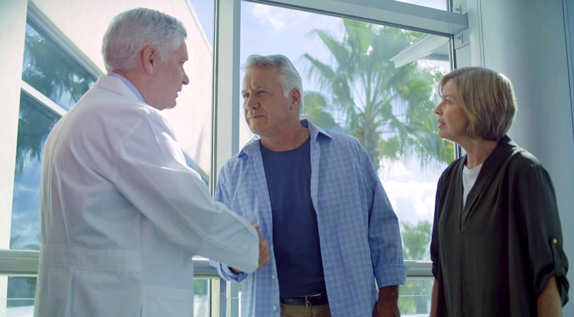 doctor shaking patients hand